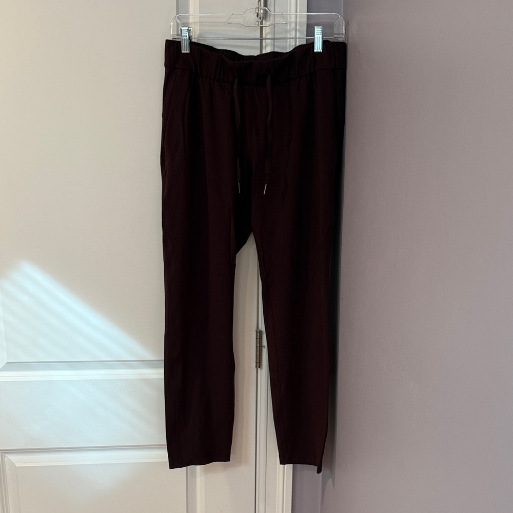 Lululemon on the fly pants - 8, maroon/wine color
